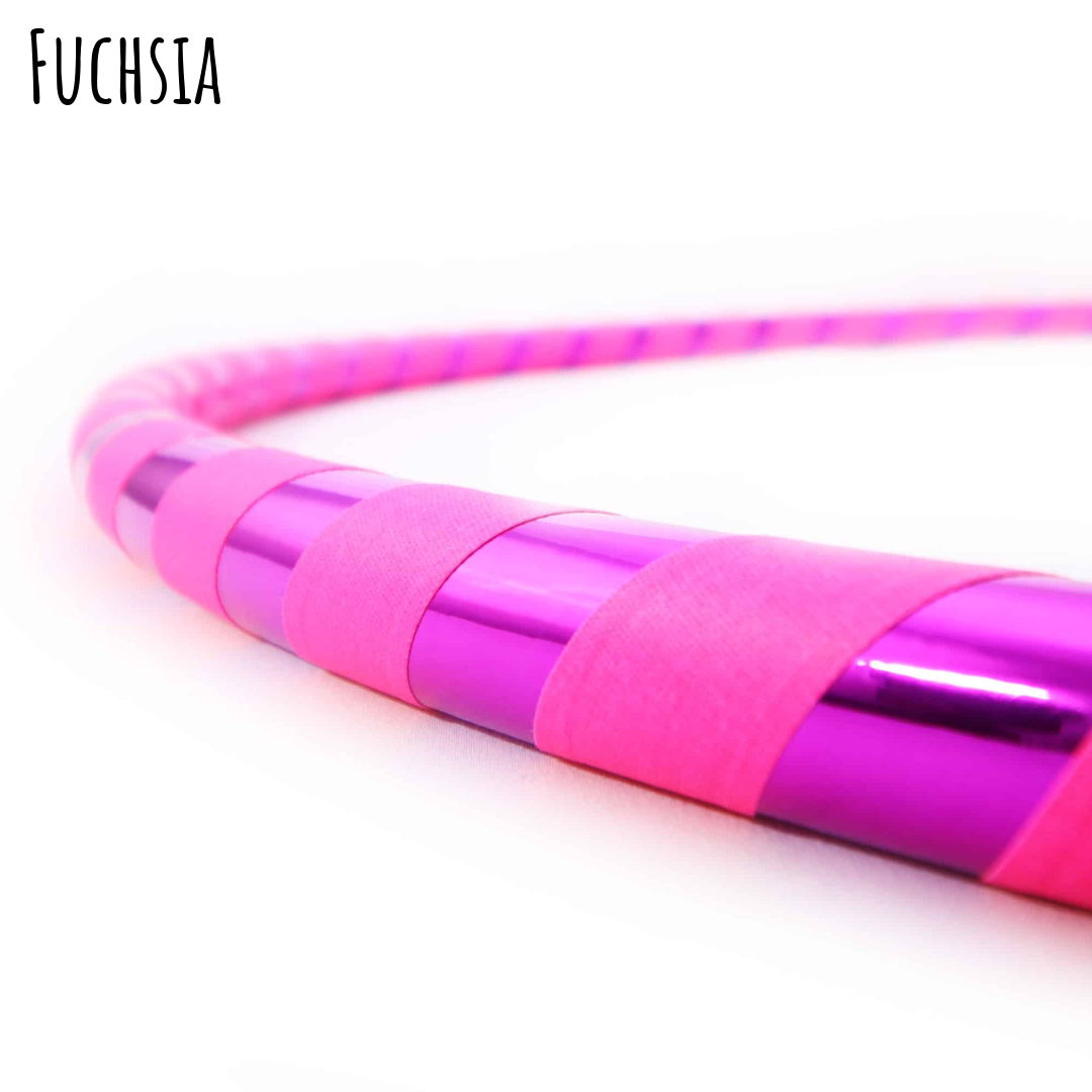Fuchsia hula hoop on a white background. Kids hula hoop - pink gaffer with pink mirror tape.
