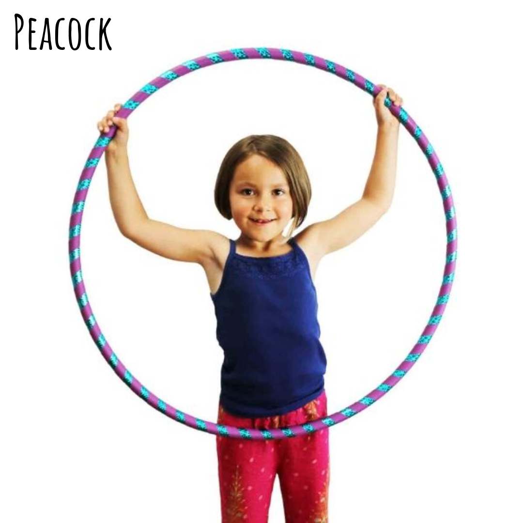 Child holding a colorful hula hoop. Peacock kids hula hoop - purple and blue.
